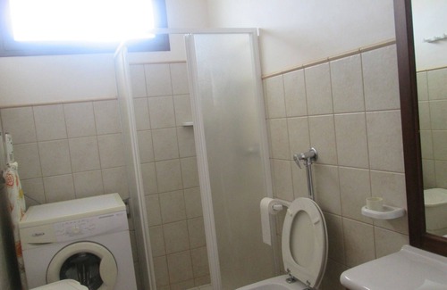 Tre Fontane Apartamento | Apartment with covered terrace and barbecue near sea and center