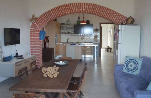 Sa Rocca Tunda Apartamento | Apartment with veranda overlooking the sea 20 meters from the beach of the locality immersed in the