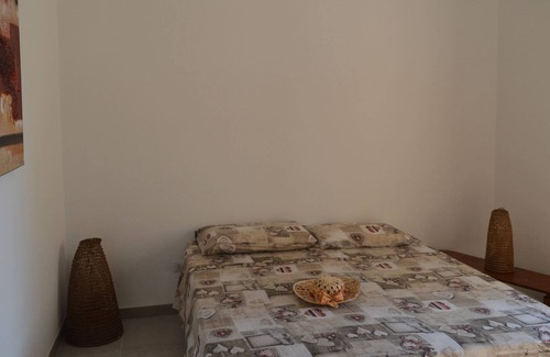Sa Rocca Tunda Apartamento | Apartment with veranda overlooking the sea 20 meters from the beach of the locality immersed in the