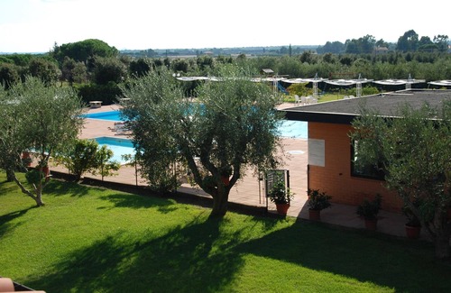 Riotorto Apartamento | Apartamento en residencia sin coches con piscina comunitaria en Vignale Riototo