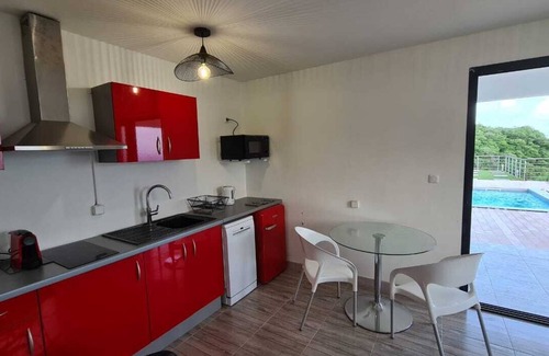 Case-Pilote Apartamento | Apartment with pool and sea view