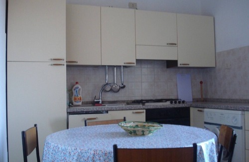 Porto Pozzo Apartamento | Apartamento con vistas al mar, ideal para 6 personas, 4 mejores playas, tiendas en el pie