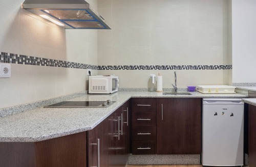 Cecos Apartamento | Apartamento 'Primero Izquierda' con jardín compartido y Wi-Fi
