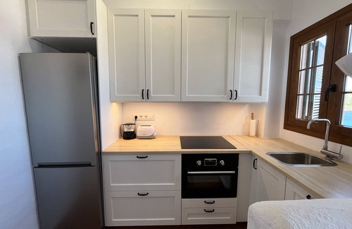 Platges de Fornells Apartamento | Apartamento con piscina y fabulosas vistas al mar