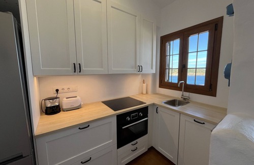 Platges de Fornells Apartamento | Apartamento con piscina y fabulosas vistas al mar