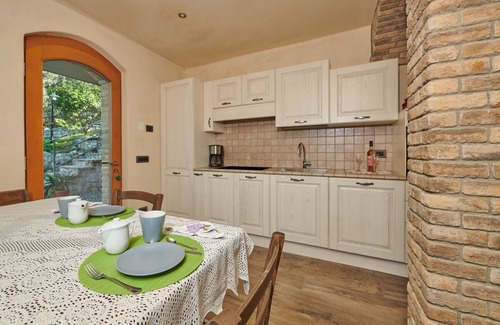 Malcesine Apartamento | Apartamento con impresionantes vistas al lago de Garda, Malcesine, terraza, jardín.