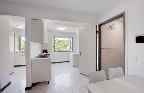 Celle Ligure Apartamento | Apartamento 'Zafferano Suites - Origano' con vistas al mar, jardín compartido y Wi-Fi