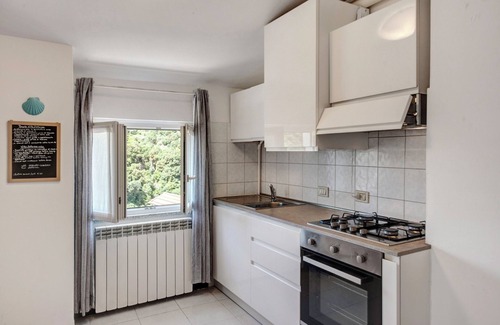 Celle Ligure Apartamento | Apartamento 'Zafferano Suites - Basilico' con jardín compartido y Wi-Fi