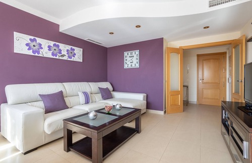 Torrox Costa Apartamento | "Apartamento en Torrox Costa" con vistas al mar, piscina, jacuzzi, Wi-Fi, A/C y jardín