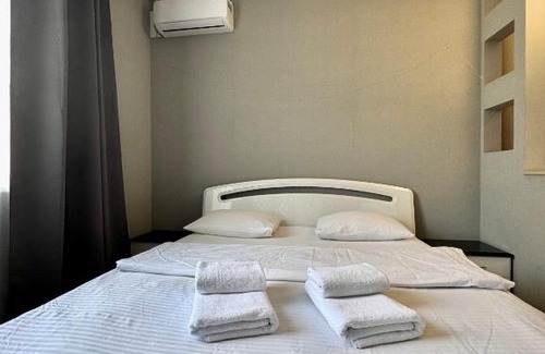 Sukhinovka Apartamento | ApartPoltava Світлі та стильні апартаменти в центрі Полтави біля театру Гоголя, ЦУМ, банківський ЧЕК