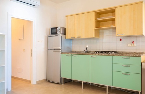 Scaglieri Apartamento | Excelente vista para los apartamentos con terraza y jardín, a pocos pasos de la playa de Forno.