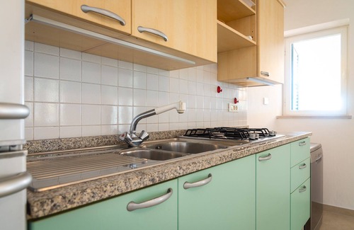 Scaglieri Apartamento | Excelente vista para los apartamentos con terraza y jardín, a pocos pasos de la playa de Forno.