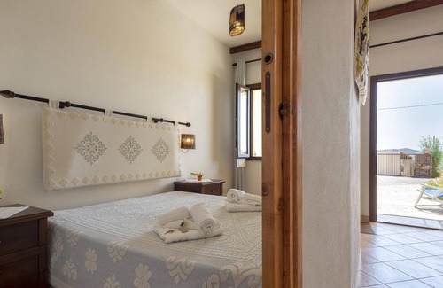 Sassari Apartamento | "Appartamento Due Posti" con vistas al mar, piscina, Wi-Fi, jardín y terraza