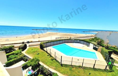 Palavas-les-Flots Apartamento | Appartement 1ere ligne piscine terrasse au bord de la plage front de mer avec 6 vélos