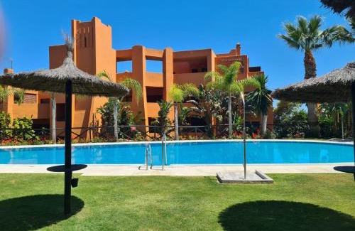 Buenas Noches Apartamento | Appartement cosy avec piscine & plage à 5 min à pied