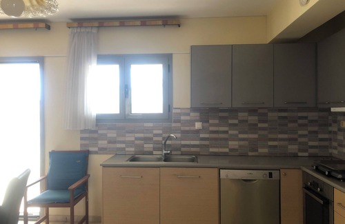 Evrostina Apartamento | Appartement en bord de mer avec piscine. Vue à couper le souffle !
