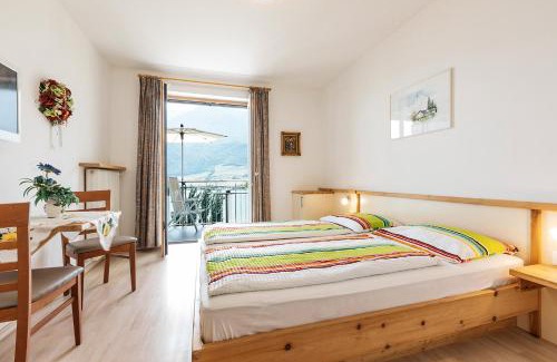 Campi al Lago Cama Y Desayuno | Appartement Florian