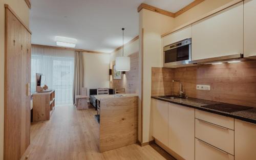 Bad Hofgastein Apartamento | Appartement Hotel Panorama-im Bademantel direkt in die Alpentherme