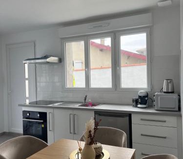Carbon-Blanc Apartamento | Appartement moderne et spacieux avec terrasse privée 1