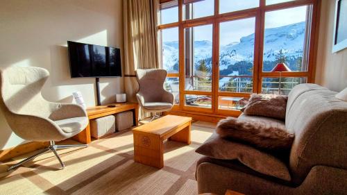 Flaine Apartamento | Appartement Premium à Flaine, altitude 1740 m, 8 à 10 personnes, au pied des pistes, piscine, jacuzzi, sauna, hammam et salle de sport