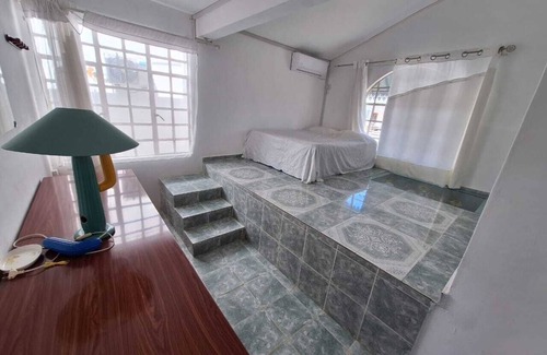 Calodyne Cama Y Desayuno | Appartement privatif ou location de chambres - Villa Lotus Paradise