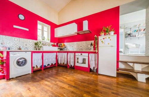 Eymoutiers Apartamento | Appartement rouge avec jardin