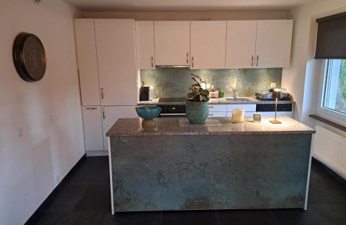 Avry-sur-Matran Apartamento | Appartement Villa du Golf & SPA