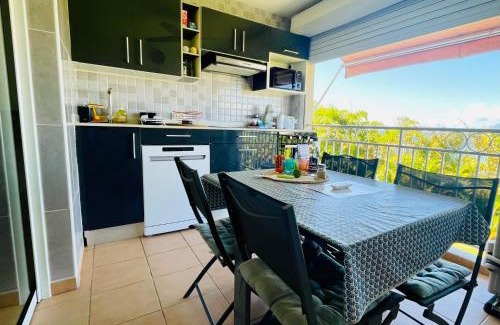 Pointe de la verdure Apartamento | Appartement vue mer, piscine, dans quartier prisé de Gosier