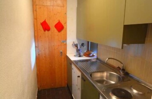 Anzere Apartamento | Apartamento con terraza incluida una entrada; Armario, un dormitorio con 2 camas individuales y un baño.
