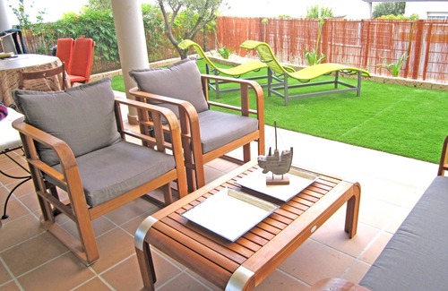 Llanca Apartamento | Apartamento planta baja y jardín en residencia con piscina