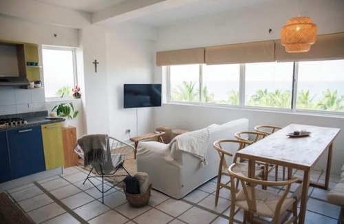 Tucacas Apartamento | Apt Frente al mar - AC - cama king - wifi rapido