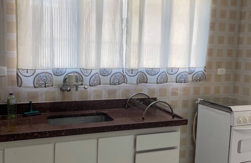 Jardim Belmar Apartamento | Apt. Temporada de Guaruja-Cove - 3 dormitorios, una suite, con capacidad para 8 personas