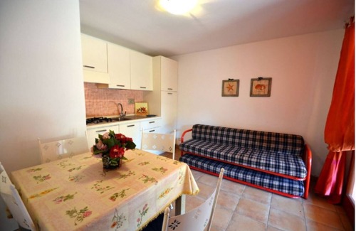 Lido di Capoliveri Apartamento | Dos habitaciones 3/4 camas en la villa pareada