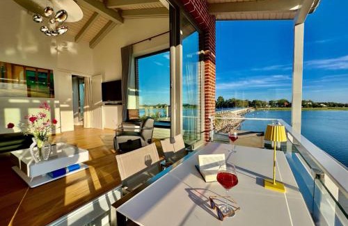 Waase Apartamento | Apt "Sunset Lounge" in Waase - Ummanz - Meerblick, Kamin, Sauna