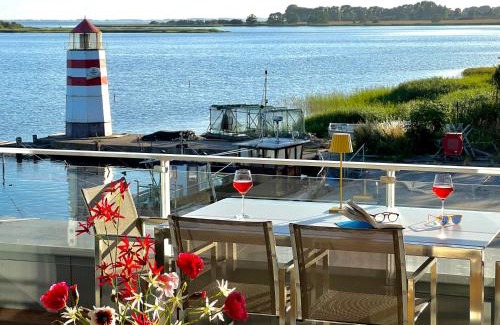Waase Apartamento | Apt "Sunset Lounge" in Waase - Ummanz - Meerblick, Kamin, Sauna