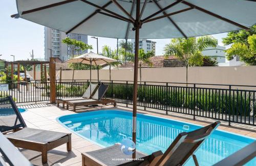 Picarras Apartamento | Apto Bal Picarras 150M PRAIA com PISICNA, sacada com CHURRASQUEIRA privativa, AR CONDICIONADO Wi Fi, PORTARIA 24h, PLAYGROUND INFANTIL, QUADRA DE ESPORTES vaga privativa de GARAGEM
