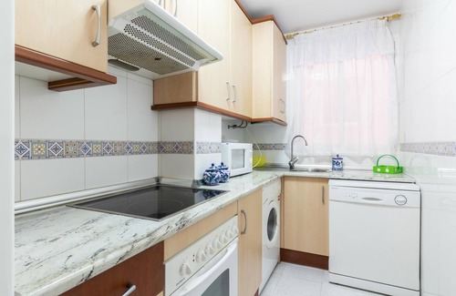 Castell de Ferro Apartamento | Apto Castell Beach. Apartamento con amplia terraza junto al mar.