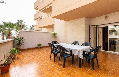 Castell de Ferro Apartamento | Apto Castell Beach. Apartamento con amplia terraza junto al mar.
