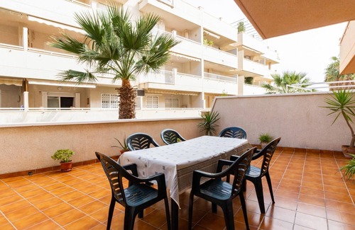 Castell de Ferro Apartamento | Apto Castell Beach. Apartamento con amplia terraza junto al mar.