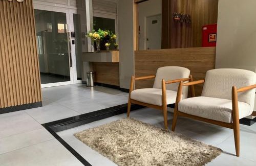 Centro Apartamento | Apto com ar wi-fi garagem no centro de Passo Fundo RS