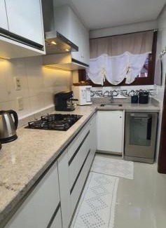 Planalto Apartamento | Apto com lareira, ar quente frio a 800m do centro