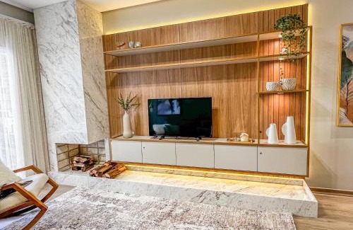 Carniel Apartamento | Apto moderno com lareira, piscina aquecida e infra completo em Gramado