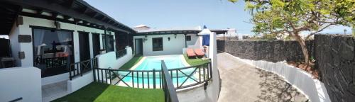 Teguise Apartamento | Aptos con piscina El Flamboyán 1