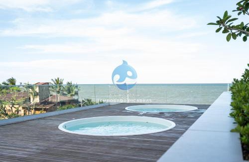 Itacolomi Apartamento | Aptos Pé na Areia Vista Mar Condomínio Resort Completo com Piscina borda Infinita, Beach Tennis, Academia, Sala de Jogos, Brinquedoteca, Playground e Portaria 24H 3 Quartos com Ar-Condicionado, Churrasqueira Privativa Reserve Agora e Viva essa Experiência