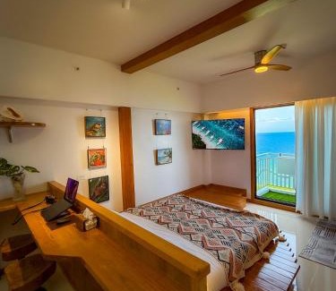 Dauis Apartamento | Aqua Horizon Beachside Condo I Signature Art Suites