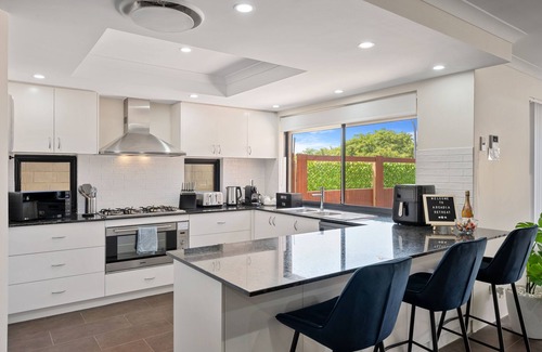 Halls Head Casa | Arcadia Retreat - 4-bed, 2.5 bath oasis with pool, theatre, and arcade machine!