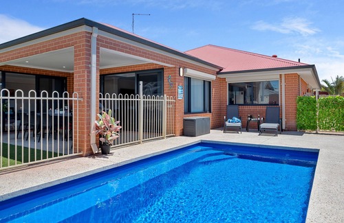 Halls Head Casa | Arcadia Retreat - 4-bed, 2.5 bath oasis with pool, theatre, and arcade machine!