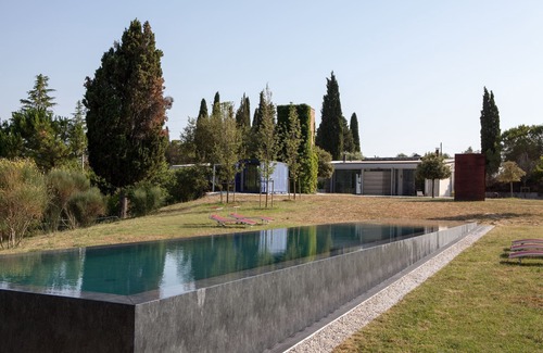 Santarello Villa | Piscina privada y aire acondicionado en un impresionante loft de diseño / arte en el campo de Montalcino