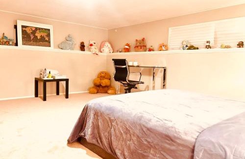 North Glenmore Casa | Artistic and stylish english charm backyard private guest house with master bedroom and living room