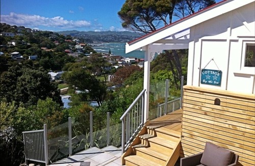 Plimmerton Cabaña | Aspen Cottage - Cottage con estilo con vistas al mar